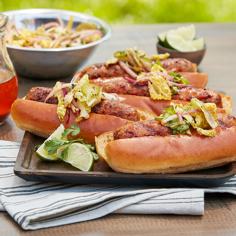 beer braised sausages with cilantro lime slaw